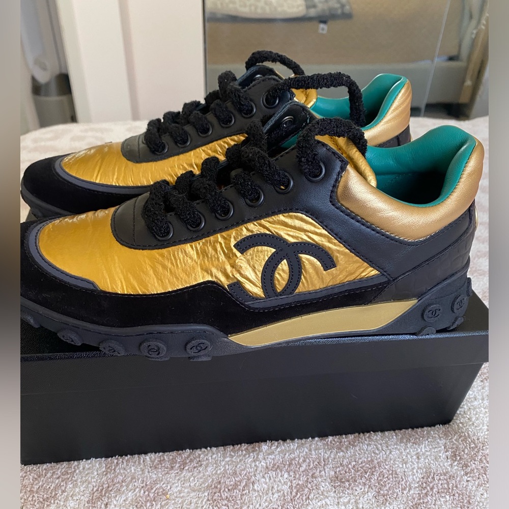 Chanel black/gold leather & suede CC low top sneakers